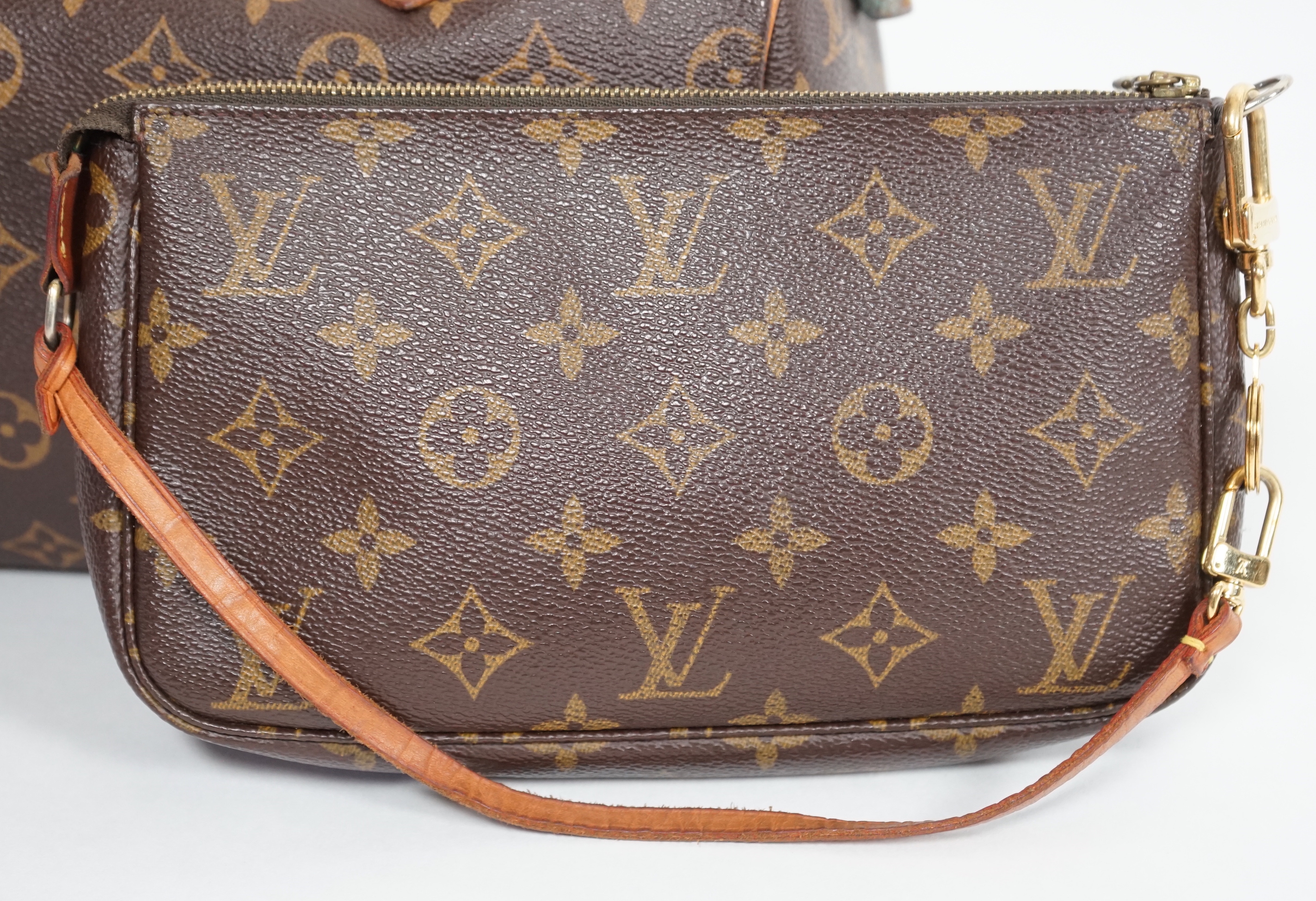 A vintage Louis Vuitton Monogram canvas Speedy 25 handbag, a Louis Vuitton Pochette Accessories Canvas bag and small Agenda PM Speedy bag: width 25cm, height overall 29cmm depth15cm, Pochette Bag: width 22cm, height 13cm